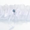 Jarretière blanche et bleue porte bonheur