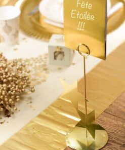 Le marque table étoile dorée support metal Paris Noel