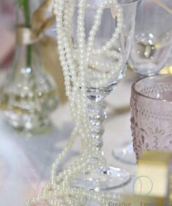 Location collier guirlande de perles ivoire 2M