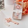 Clé vintage cuivrée or rose décapsuleur