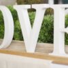 LOCATION grandes lettres LOVE blanc et bois