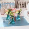 Location petits vases soliflore bleu en verre